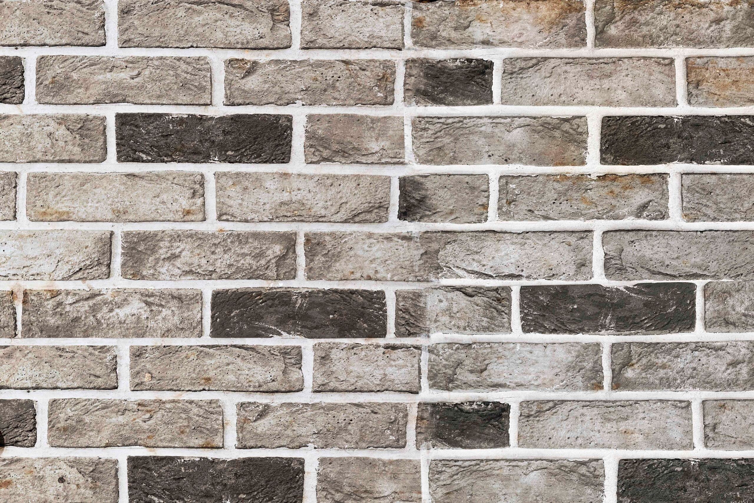 Umetnička slika Grey and brown brick wall na platnu - NS Canvas Shop
